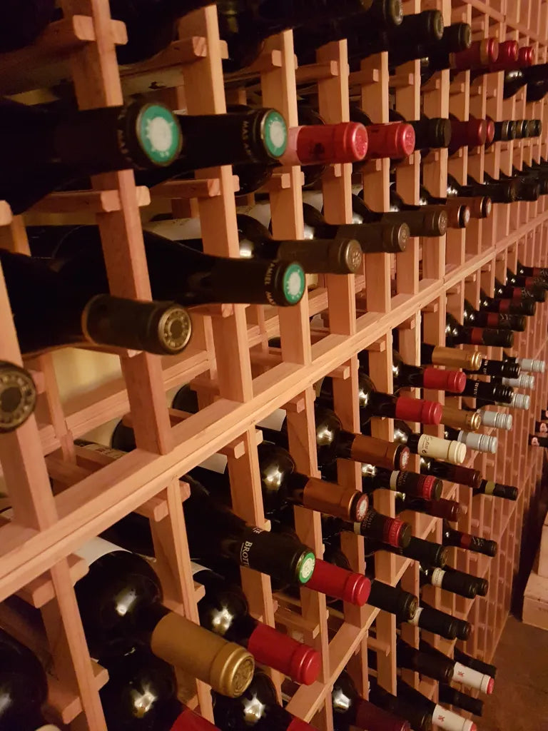 private wine cellar with wine bottles in a rack